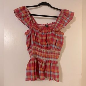 Plaid top with smocking around the middle